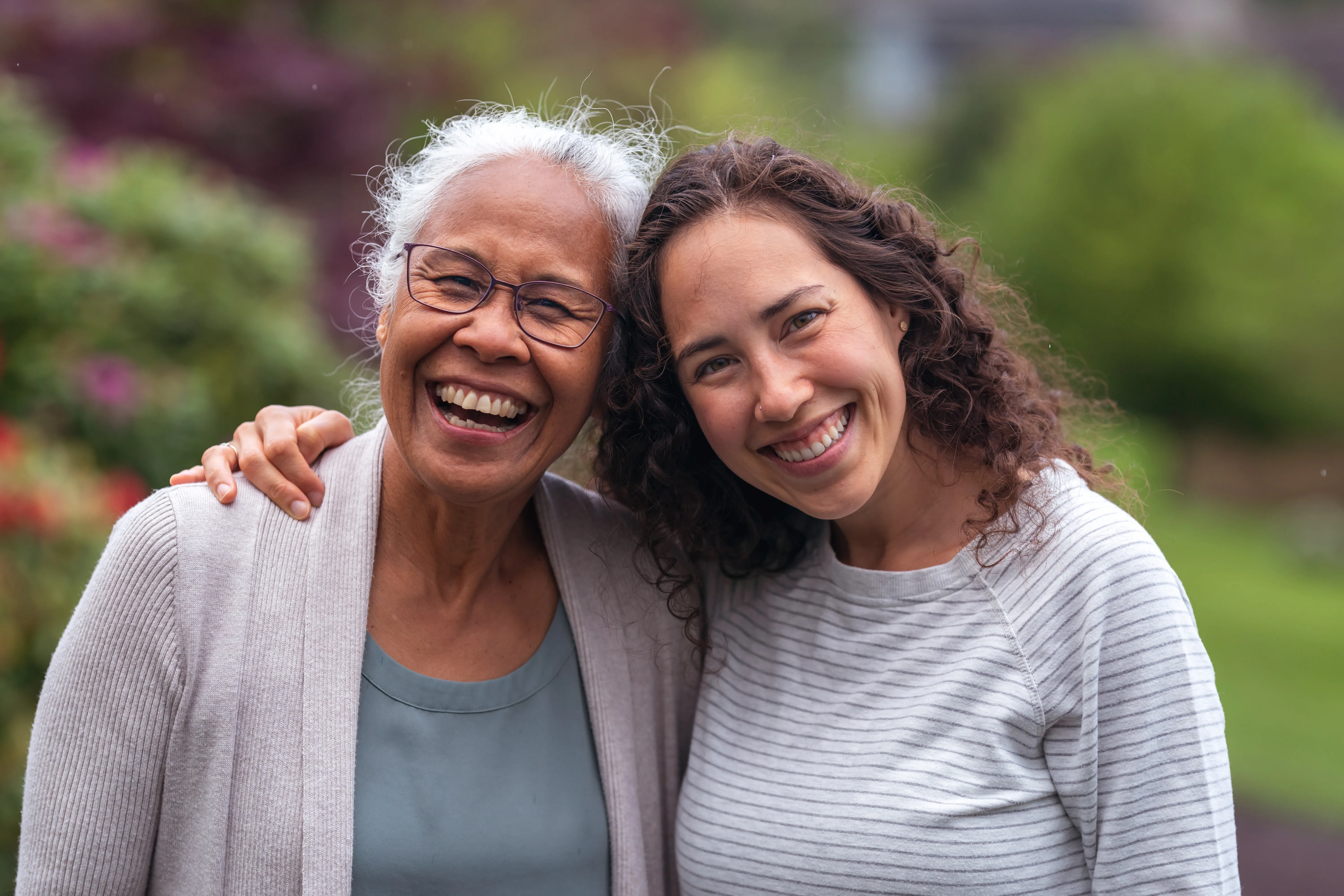 A happy senior receiving companion care in Northern Michigan